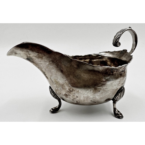 178 - George III silver sauce boat, engraved crest of a stag, maker WS, London 1785, 16cm long, 5.5oz appr... 