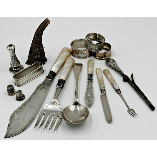 188 - Mixed silver comprising - pearl handled fish servers, three further silver handled cutlery, table sp... 