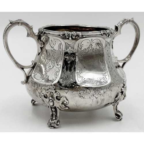 189 - Good quality Victorian silver twin handled sugar bowl, faceted baluster form, engraved scrolled pane... 