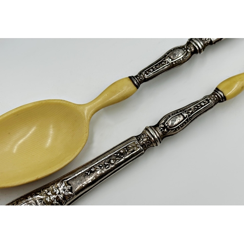 211 - Cased silver handled bone serving fork and spoon