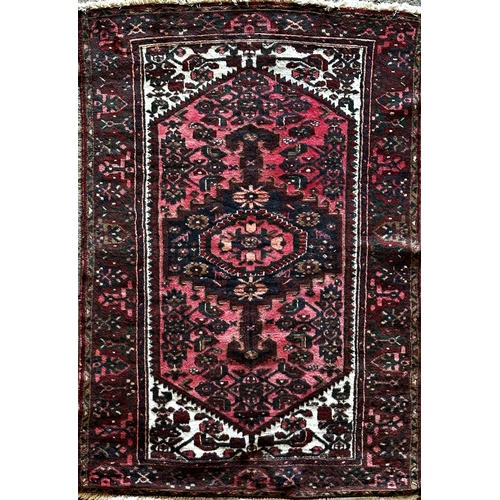 1444 - Persian full pile Hamadam rug, floral medallions on deep red ground, 190 x 130cm