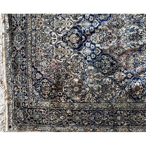 1447 - Antique Keshan carpet, blue floral medallions on a cream ground, 300 x 210cm