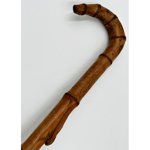 394 - Chinese bamboo walking stick, the shaft carved with a cicada, 101cm long