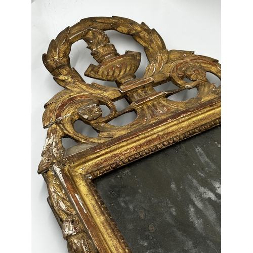 1173 - Good antique Florentine giltwood and gesso wall mirror, with flaming urn pediment and original pitte... 