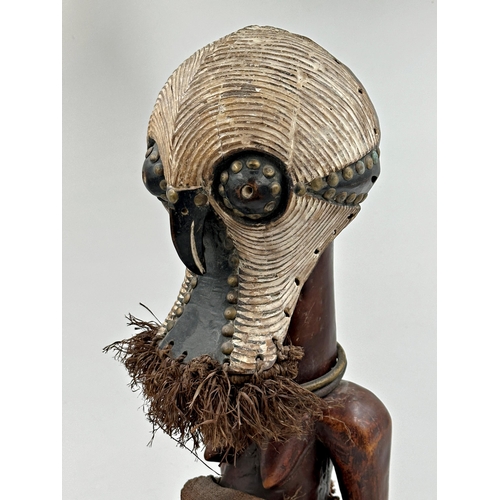 314 - Tribal Interest - Songye power figure from DR Congo, with carved grotesque mask, 60cm high