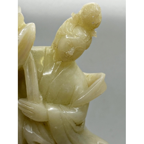 318 - Chinese carved hardstone (possibly jade) figure of Guan Yin, 21.5cm high