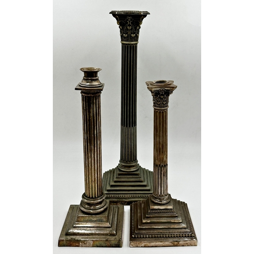 81 - Three silver plated Corinthian column table lamps, the largest 46cm high