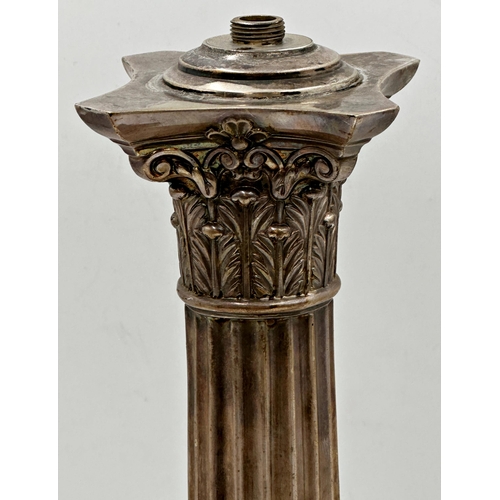 83 - Two similar silver plated Corinthian column table lamps, converted to electricity, 33cm high (2)