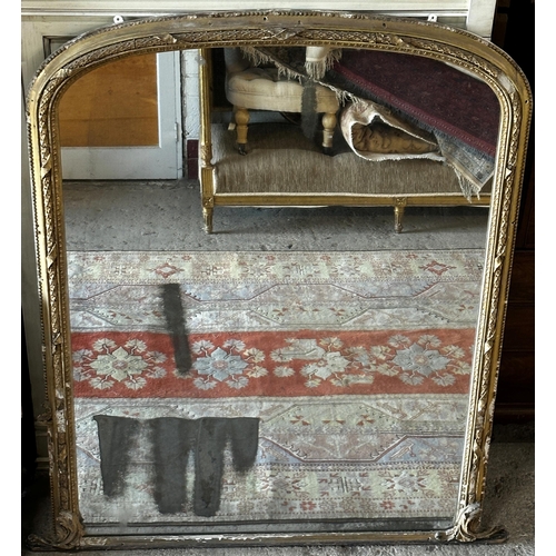 1180 - Antique Florentine giltwood overmantel mirror the original pitted glass framed by various darted and... 