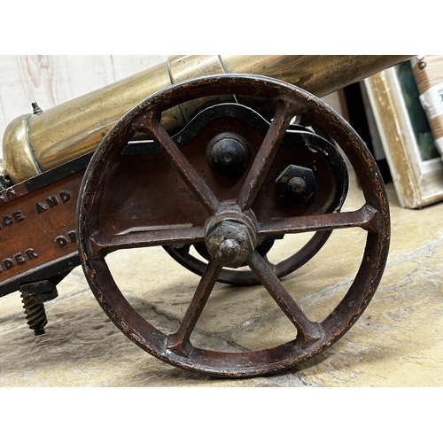 1080 - Impressive 19th century bronze cannon / canon on a cast iron stand with wheels and traces of origina... 