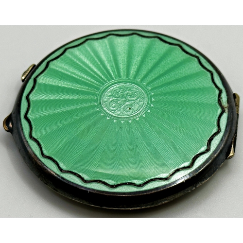 132 - Silver and guilloche enamel compact, 6.75cm diameter, 2.5oz approx