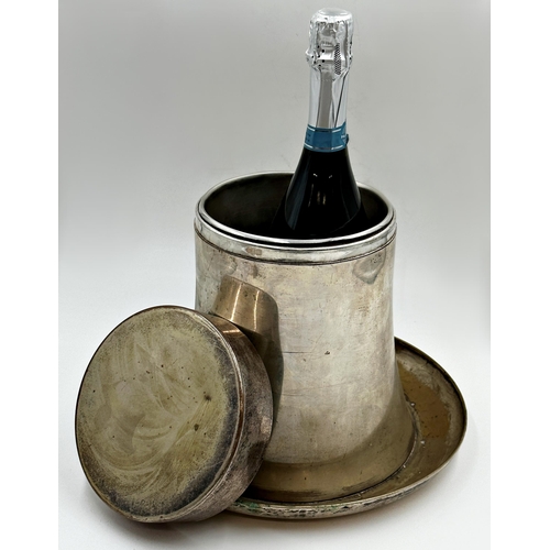 94 - Novelty silver plated wine cooler in the form of a top hat, 24cm high.