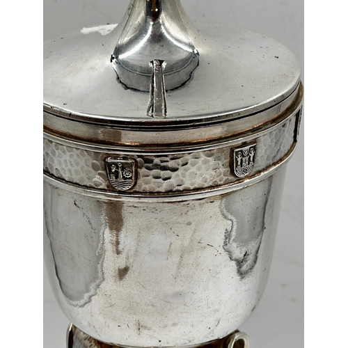 97 - Good quality continental white metal lidded jar on stand in the manner of Charles Ashbee, the lid wi... 