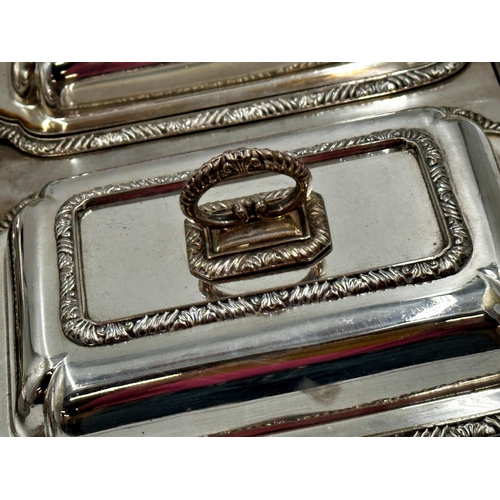 98 - Two twin fitted silver plated entree dishes, both fitted with twin handles and fitted interior, the ... 