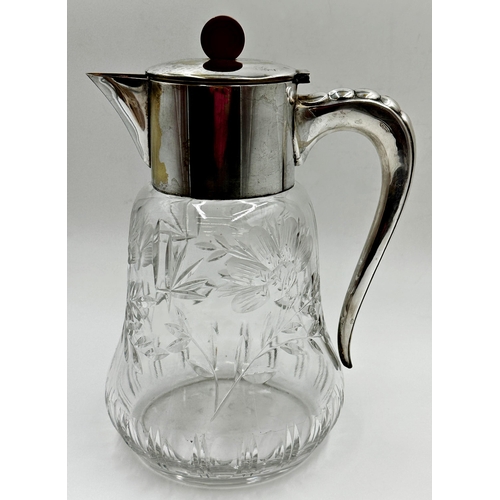 107 - Exceptional quality Art Deco cut glass and silver plated lemonade jug with Bakelite handle to the hi... 