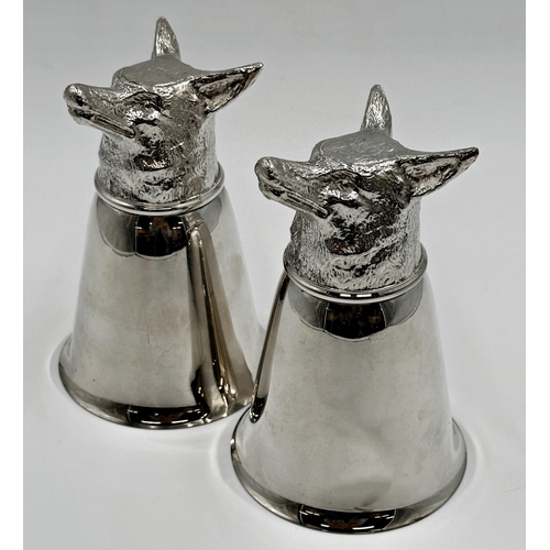 116 - Pair of fox head stirrup cups marked Italy.