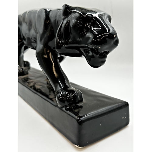 341 - Art Deco ceramic black panther 28 x l70cm