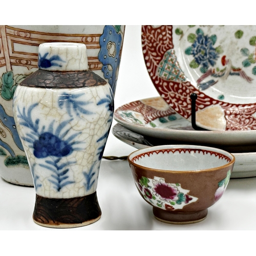 327 - A mixed collection of 10th century and later Chinese porcelain, comprising a tea cup and saucer deco... 