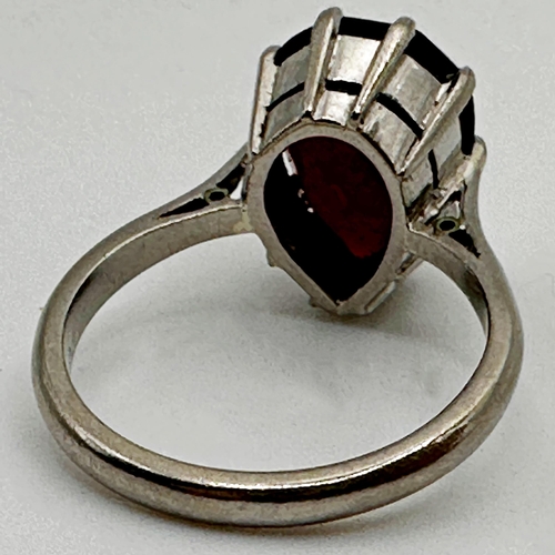 238 - 18ct white gold garnet ring, size J/K, 5.2g