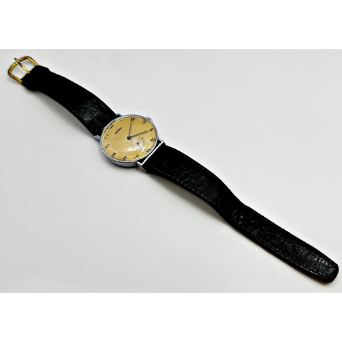 14 - Vintage Vulcan gents stainless steel wristwatch, gilt dial with Arabic numerals and subsidiary secon... 