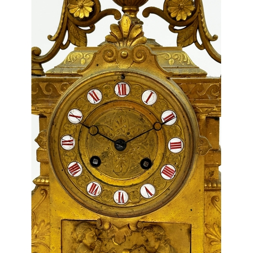 44 - French Empire gilt spelter mantel clock with 2 train dial with inset enamel cabochon Roman numerals,... 