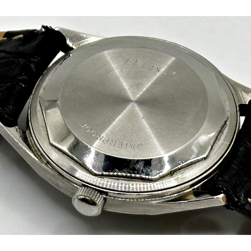 9 - Vintage Zenith Automatic gents stainless steel dress watch, black dial with stainless baton markers,...