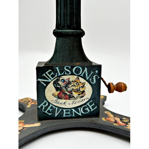 52 - Frank Nelson (1930-2012) - 'Nelsons Revenge', bespoke made automaton of Nelson batting away pigeons ... 