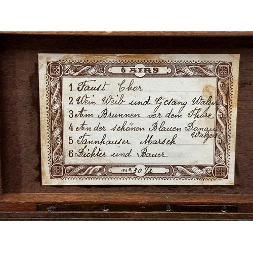 58 - Early 20th century Thorens walnut cased musical snuff box, playing six airs, 15.5cm long, currently ... 