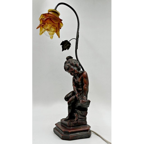 1140 - Resin bronze figural Art Nouveau style table lamp modelled with a seated cherub upon a stepped squar... 