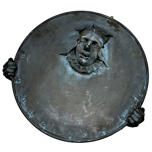 1075 - Cold cast resin bronzed sun dial base in the form of a clown holding a disc, 50cm diameter