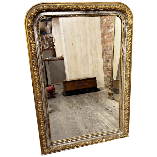 1179 - 19th century giltwood and gesso arched overmantel mirror the original glass plate framed by beaded a... 