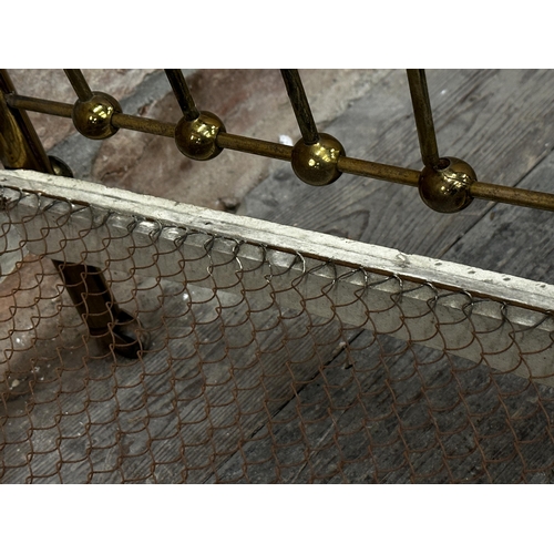 376 - 19th century brass apprentice piece bed, with sprung base, 38 x 66cm