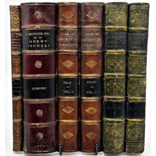 440 - A collection of eight dummy book spines, each 30cm x 30cm approx.