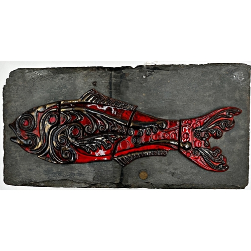 1274 - Jersey Pottery studio pottery wall plaque, red glazed fish on a slate base, 30 x 61cm