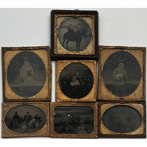 1386 - Collection of seven Daguerreotypes, to include family portraits, in typical gilt frames, the largest... 