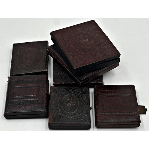 1388 - Collection of seven Daguerreotypes, all in good quality folding leather cases, the largest 9.5 x 8.2... 