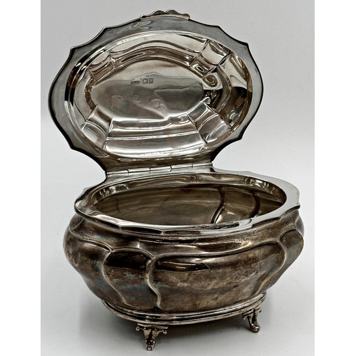 219 - Asprey of London large bombe shaped silver caddy or casket, the hinged lid engraved with a heraldic ... 