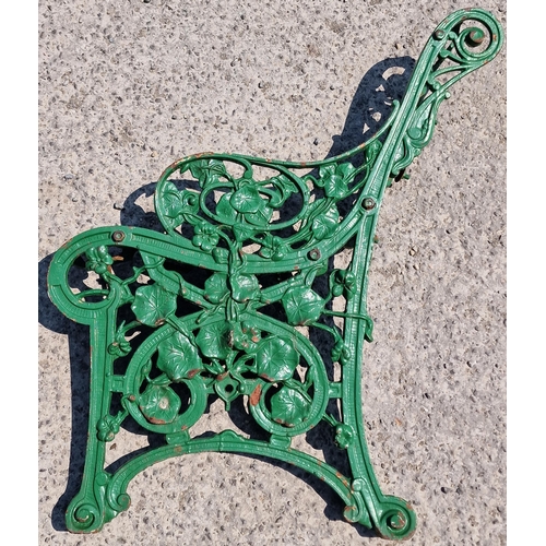 1036 - A pair of cast iron Coalbrookdale Nasturtium design bench ends with green painted finish, 82cm high