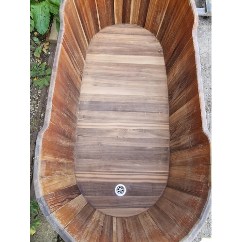 1002 - A good coopered barrel bath tub/planter with removable lid and drainage hole, 64cm high x 160cm long... 