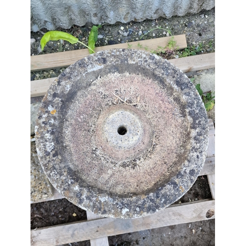 1017 - A pair of weathered reconstituted bird baths on spiral twist columns, 68 x 36cm (2)