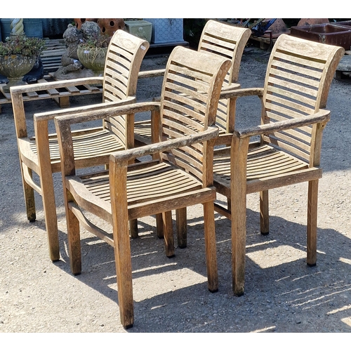 1024 - A set of four Cotswold Collection weathered teak garden armchairs with slatted backs, 86 x 63cm (4)