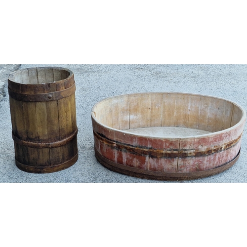 1027 - Antique coopered oak barrel (lacks top), 50 x 34cm, together with a coopered half barrel planter (2)