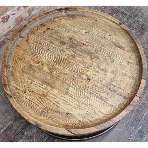 1200 - Vintage industrial dished pine top coffee table on a tubular steel frame, 40cm x 100cm.