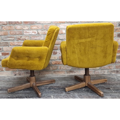 1204 - Pair of 1960s swivel lounge chairs, with buttoned upholstery and teak bases, 90cm high (2).