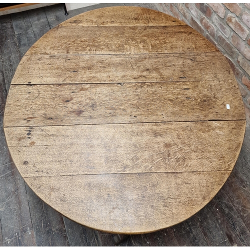 1311 - Early 18th century oak gateleg table with wavy apron fitted with a single drawer united by stretcher... 