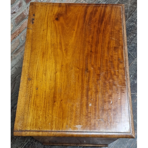 1313 - Compact 19th century mahogany chest of four long drawers upon turned feet, 70cm x 60cm.