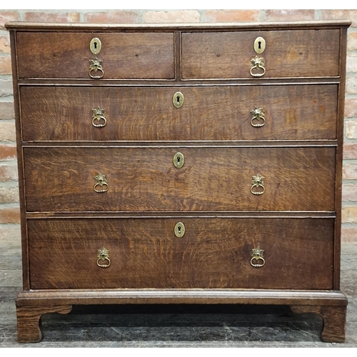 1314 - Good quality Georgian oak chest of drawers fitted with ring handles and further brass fittings, 2 sh... 