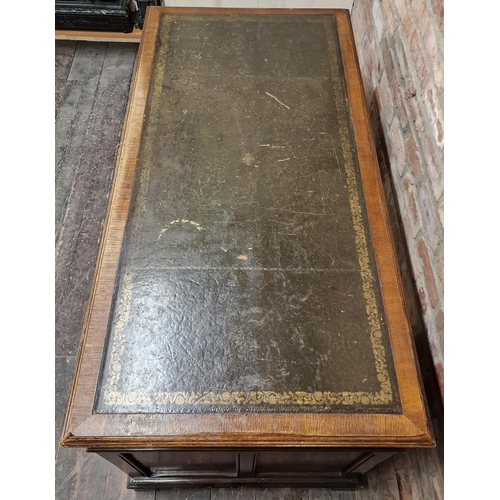 1315 - Good quality mid 20th century reclaimed oak twin pedestal desk with gilt and green leather top over ... 