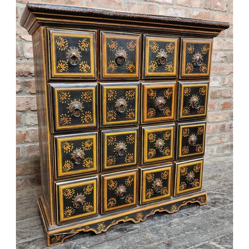 1332 - Painted Indian specimen or spice cabinet with sixteen square drawers with ring handles painted flora... 