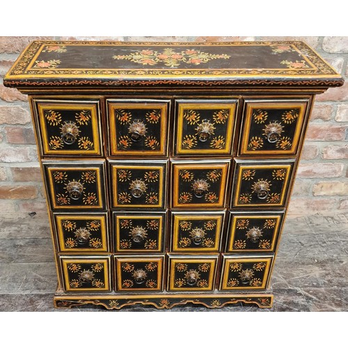 1332 - Painted Indian specimen or spice cabinet with sixteen square drawers with ring handles painted flora... 